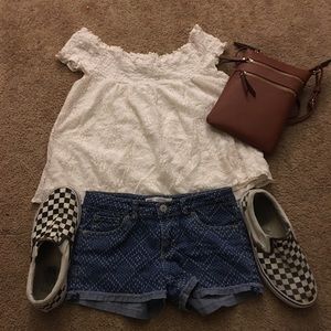 Of shoulder top, and Levi’s shorts